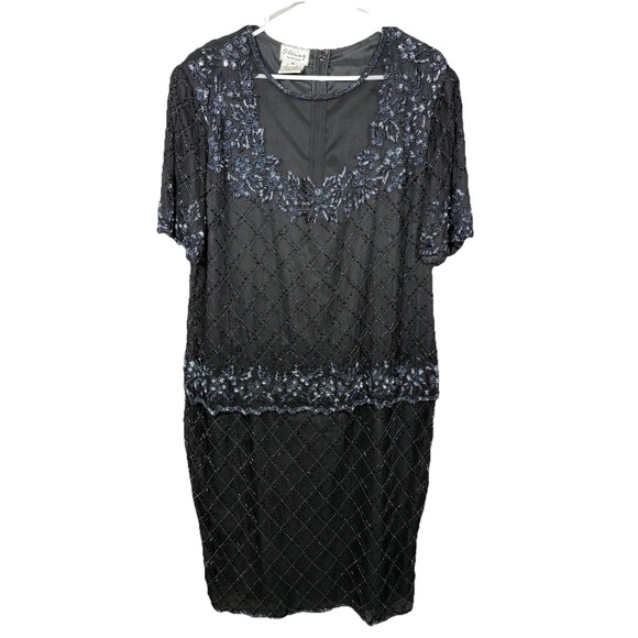 stenay beaded dress Rarely available! This black beaded dress by Stenay is a beautifully embellished dress with sparkling hand sewn beads, demonstrating truly skilled workmanship. A vintage designer label, primarily active in the 1980s and